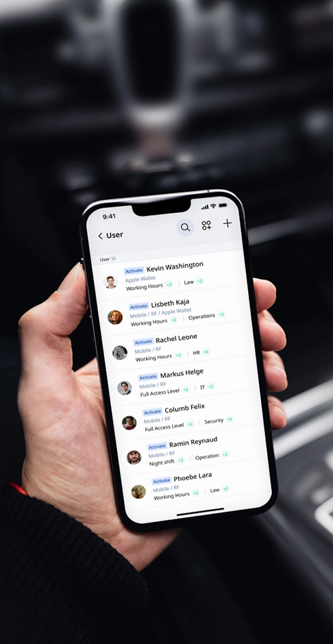 User management screen on BioStar Air mobile app with credential types, access levels, and activation status.